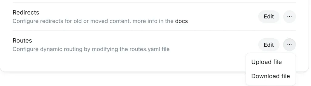 Ghost Admin Labs settings: the Routes row with its menu open, showing Upload file and Download file